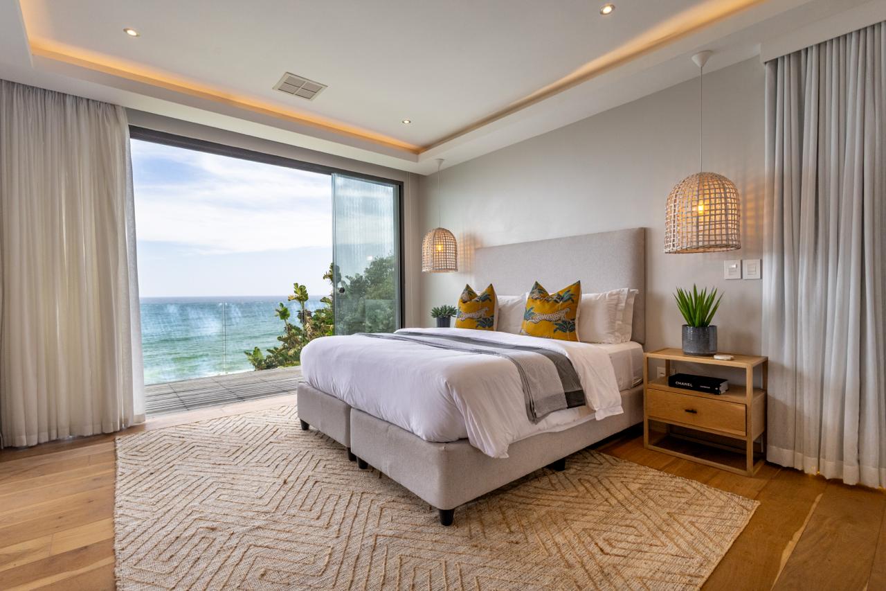 Whitefoord Beach House bedroom with sea view