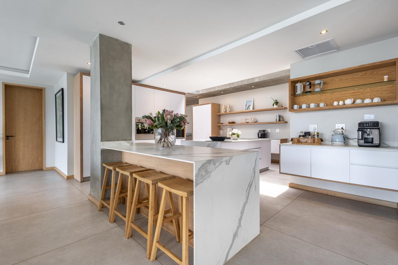 Whitefoord Beach House kitchen island with timber stools